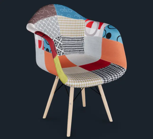 A colorful patchwork chair using 3D texturing for a vibrant interior design look.